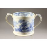 A STAFFORDSHIRE LOVING CUP, with blue transfer printed decoration. 5ins high.