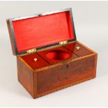 A GEORGE III MAHOGANY AND INLAID TEA CADDY, the interior with two lidded compartments and mixing