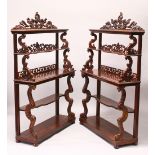 A VERY GOOD PAIR OF 19TH CENTURY MAHOGANY OPEN FRONTED STANDING BOOKCASES with pierced wood