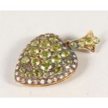 A 9CT GOLD AND SILVER PERIDOT AND DIAMOND HEART SHAPE LOCKET.