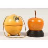 A CARVED WOOD APPLE SHAPE MONEY BOX, and a turned wood string box (2).