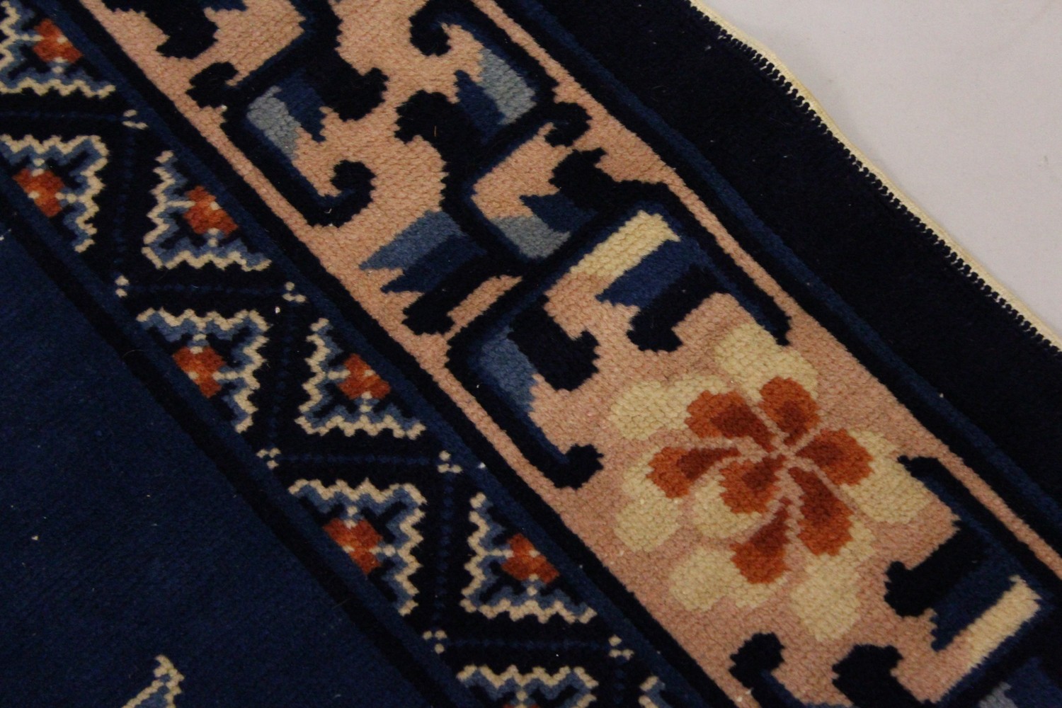 A SMALL CHINESE CARPET, with blue ground, with design of storks. 6ft 9ins x 4ft 4ins. - Image 4 of 8