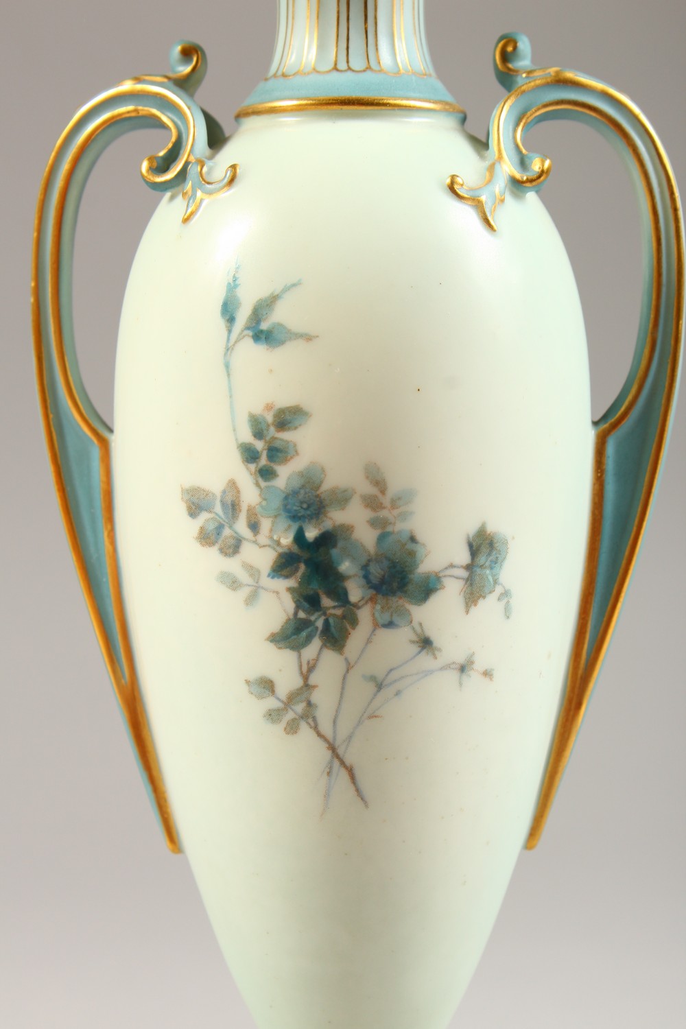 A ROYAL WORCESTER PEDESTAL VASE, No. 1957, pale blue ground decorated with floral sprays. 8.5ins - Image 3 of 7