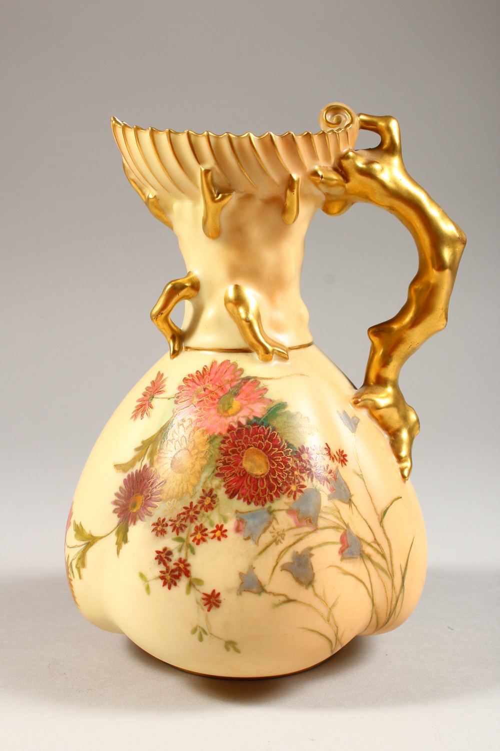 A ROYAL WORCESTER BLUSH IVORY JUG, No. 1507 with naturalistic handle and floral decoration. 7ins - Image 3 of 9