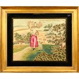 A 19TH CENTURY SILK AND WOOLWORK PICTURE, of a young lady and child in a rural landscape, framed and