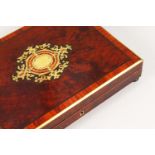 A 19TH CENTURY BURRWOOD AND BRASS INLAID BOX, the interior fitted with gaming counters. 12ins wide.