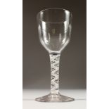 A LARGE 18TH CENTURY GOBLET, with opaque air twist stem. 7.5ins high.