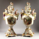 A LARGE PAIR OF MEISSEN STYLE TWIN HANDLED VASES, COVERS AND STANDS, with floral encrusted