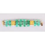 A GOOD EMERALD, PEARL AND GOLD BRACELET.