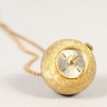 A LADIES' PENDANT WATCH on a gold chain.