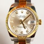 A SUPERB ROLEX STEEL AND GOLD WRISTWATCH OYSTER PERPETUAL DATEJUST, set with ten diamonds (never