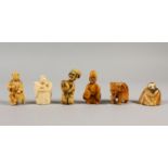 A GROUP OF SIX JAPANESE CARVED IVORY NETSUKE / OKIMONO depicting a warrior, an elephant, one holding