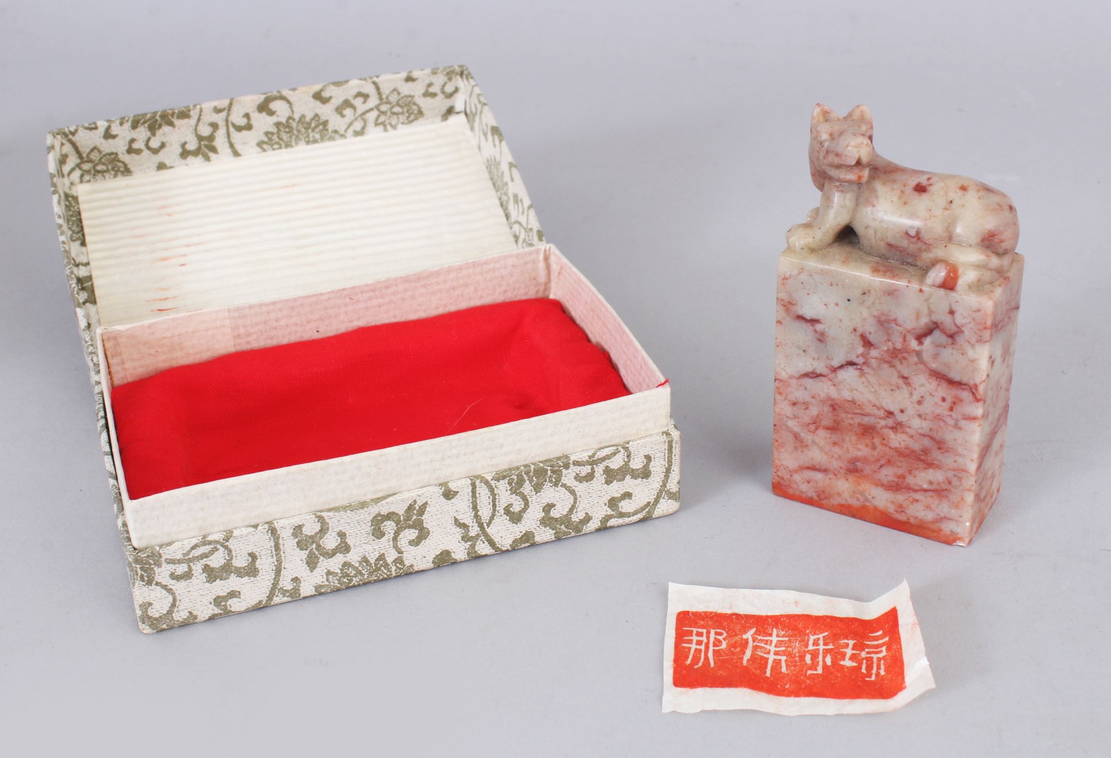 A CHINESE RECTANGULAR SOAPSTONE SEAL, in a fitted box, the seal 7.8cm high & 4cm wide.