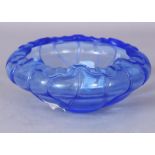 AN UNUSUAL CHINESE BEIJING PALE BLUE GLASS LOTUS BOWL, the base with a four-character Qianlong mark,