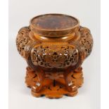 LARGE JAPANESE MEIJI PERIOD HARDWOOD STAND, with pierced and carved floral decoration, 34cm high,