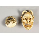 A JAPANESE CARVED IVORY NOH MASK NETSUKE WITH OJIME BEAD, mask depicting the face of the devil,