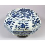 A CHINESE MING STYLE BLUE AND WHITE PORCELAIN POT AND COVER, octagonal form with dragon, phoenix,