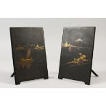 PAIR OF DAMASCENED IRON PLAQUES IN THE KOMAI STYLE, finely decorated with traditional scenes, with