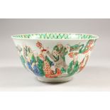 A CHINESE KANGXI PERIOD FAMILLE VERTE PORCELAIN BOWL, circa 1700, of larger than average size, the