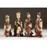 A SET OF FOUR CHINESE CARVED AND STAINED IVORY FIGURES "SNUFF BOTTLES". 9cm high.