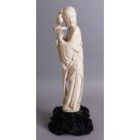 A LARGE & FINE QUALITY CHINESE IVORY FIGURE OF A BEAUTIFUL WOMAN / MAIDEN, wearing traditional robes