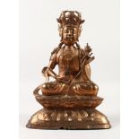 A TIBETAN BRONZE FIGURE OF A GODDESS, possibly Syamatara ( tara ), seated upon a lotus base with