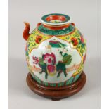 A 19TH CENTURY CHINESE FAMILLE ROSE TEAPOT AND COVER, nicely decorated with vibrant enamel colours