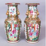 A PAIR OF 19TH CENTURY CHINESE CANTON PORCELAIN VASES, each painted in typical palette with