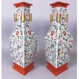 AN UNUSUAL PAIR OF GOOD QUALITY CHINESE FAMILLE ROSE TRIANGULAR SECTION PORCELAIN ARROW VASES, the