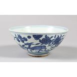 A CHINESE BLUE AND WHITE PORCELAIN RICE BOWL, decorated with deer and birds, six-character mark to