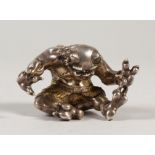 A JAPANESE HEAVY CAST SOLID SILVER OKIMONO / PAPERWEIGHT, depicting an Oni on his hands and knees,