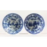 A PAIR OF CHINESE BLUE & WHITE PORCELAIN BOWLS, with decorated panels of figures, 15cm diameter, 5cm