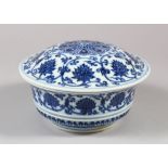 A CHINESE BLUE AND WHITE MING STYLE PORCELAIN POT AND COVER, with scrolling lotus flower decoration,