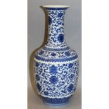 A CHINESE MING STYLE BLUE & WHITE PORCELAIN VASE, the sides decorated between formal borders with