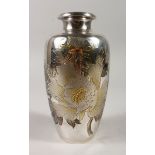 A GOOD JAPANESE SILVER & MIXED METAL VASE, carved with katakiribori floral decoration, artist signed
