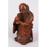 A FINE QUALITY CHINESE HARDWOOD FIGURE OF SHOU XIAN, late 19th century / early 20th century, inset