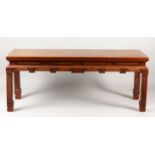 A GOOD QUALITY 19TH CENTURY CHINESE LOW HARDWOOD RECTANGULAR TABLE, the frieze and feet carved in