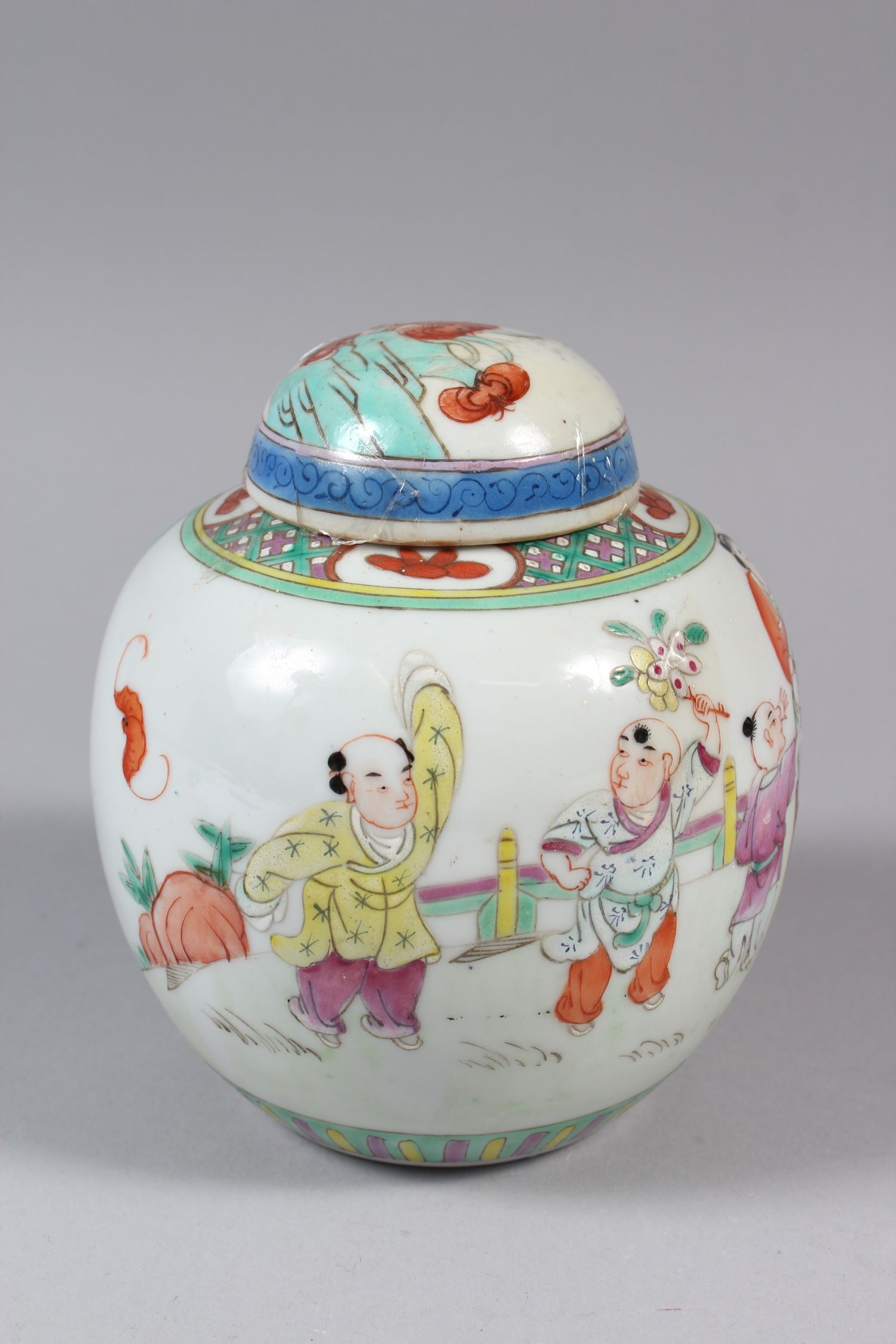 A CHINESE WUCAI GINGER JAR WITH COVER, decorated with parading people, surrounding a fishbowl - Image 2 of 6