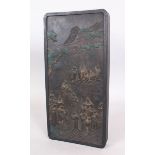 A LARGE 20TH CENTURY CHINESE BLACK INKSTONE, together with a fitted box, with moulded decoration and