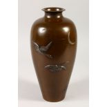A LARGE FINE QUALITY JAPANESE BRONZE & MIXED METAL ON LAID VASE, depicting flying geese amidst