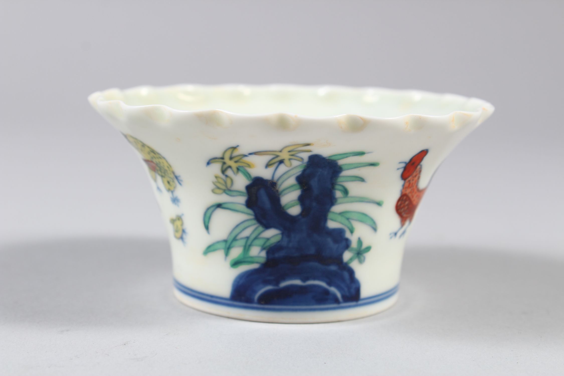 A CHINESE DOUCAI PORCELAIN BOWL, with pleated rim, decorated with roosters and flora, six- - Image 2 of 7