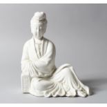 CHINESE BLANC DE CHINE FIGURE OF GUANYING, 20.5 cm high, 17cm wide.