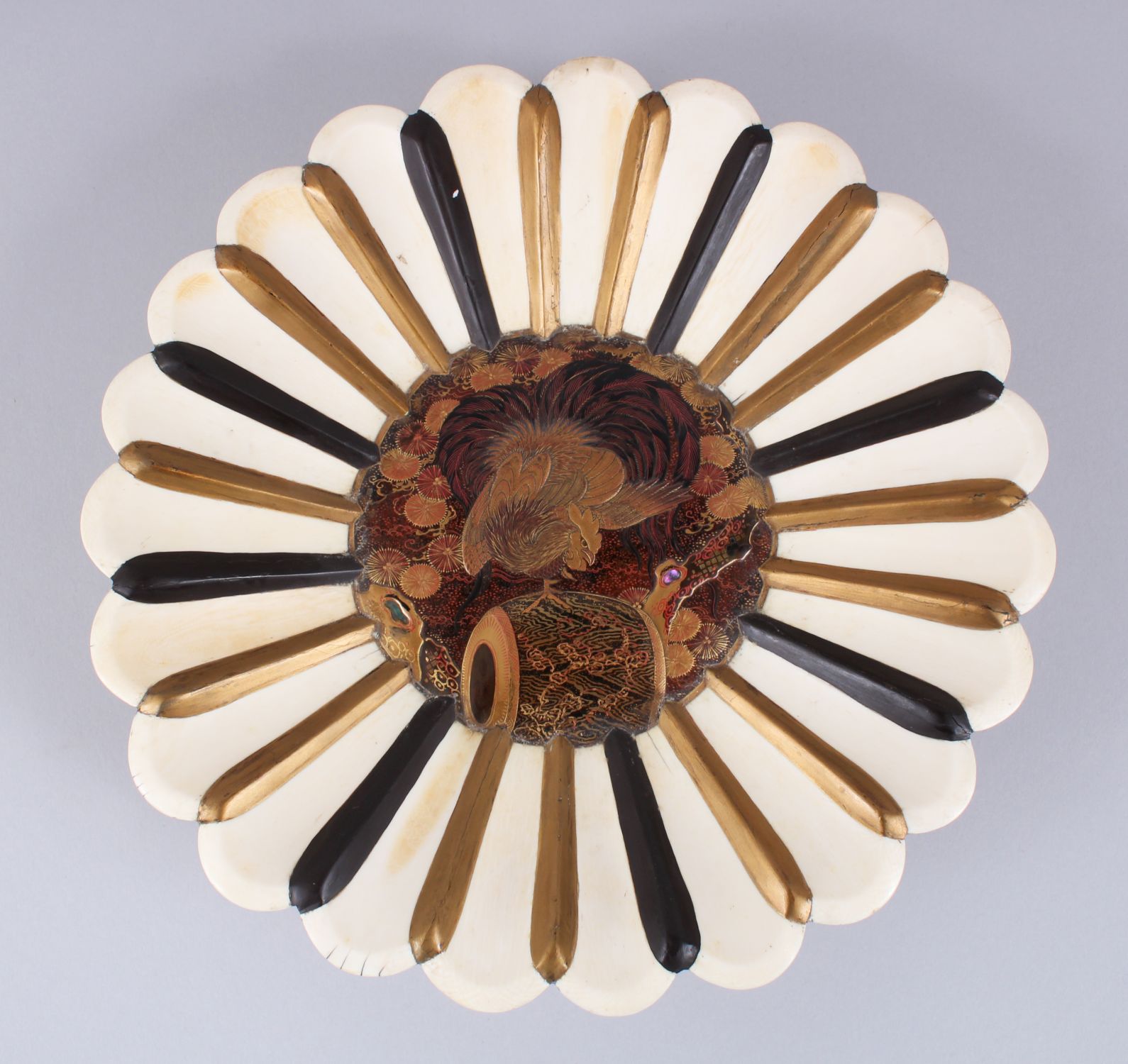 A GOOD JAPANESE MEIJI PERIOD CARVED IVORY & GOLD LACQUER CHRYSANTHEMUM FORM DISH, the petals