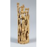 A CARVED CHINESE IVORY FIGURE, depicting an elder holding his staff, 20cm high, 6cm wide.