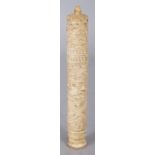 A 19TH CENTURY CHINESE CANTON IVORY BODKIN CASE, with screw-action top, the interior with a