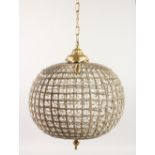 A BRASS AND GLASS BALL SHAPED CHANDELIER. 20ins high.