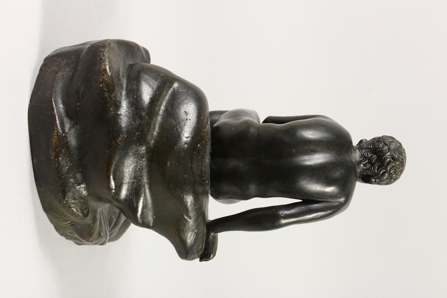 AFTER THE ANTIQUE A BRONZE OF HERMES, sitting on a rock. 19cms high. - Image 5 of 10