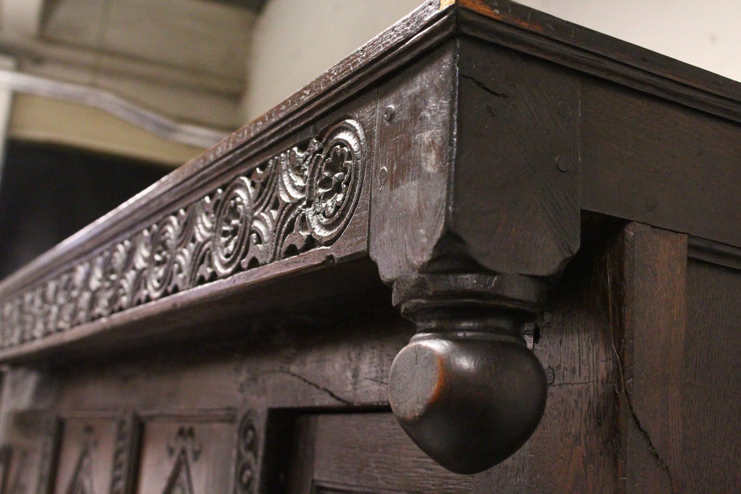 A 17TH/18TH CENTURY OAK COURT CUPBOARD, with carved frieze over two carved central panels flanked by - Image 9 of 10