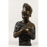A BRONZE BUST OF A CLASSICAL YOUNG LADY. 46cms high.