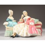 A ROYAL DOULTON PORCELAIN GROUP, "THE LOVE LETTER", No. HN2149. Issued No. 1958-1976. 13cms high.